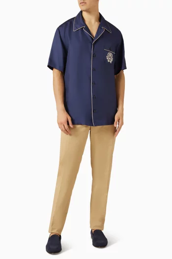 قميص بجيب مزين بشعار الماركة حرير