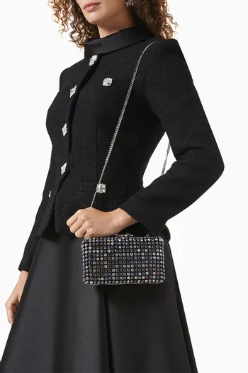 كلاتش بتصميم متشابك مرصع بالكريستال