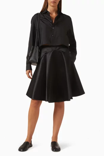 تنورة متوسطة الطول بحافة مدببة ستان مزدوج