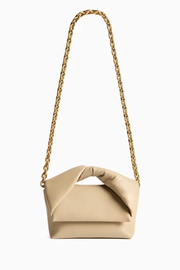 حقيبة متوسطة بيد علوية ملفوفة جلد