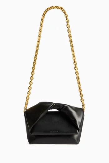 حقيبة متوسطة بيد علوية ملفوفة جلد