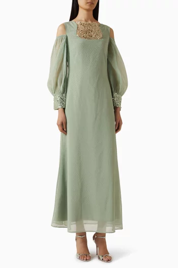 فستان مزين بتطريزات بالخرز