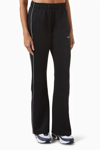 بنطال رياضي واقٍ من الرياح بقصة ضيقة