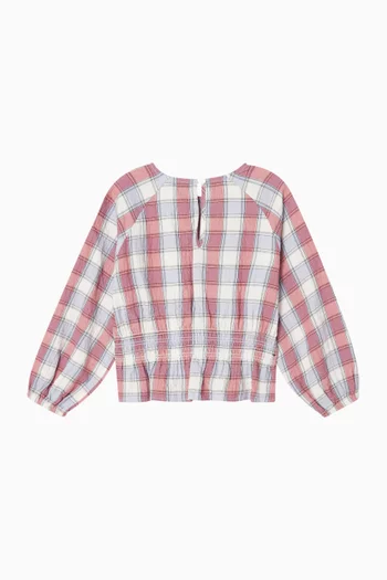 بلوزة بكشكش ونقشة مربعات 