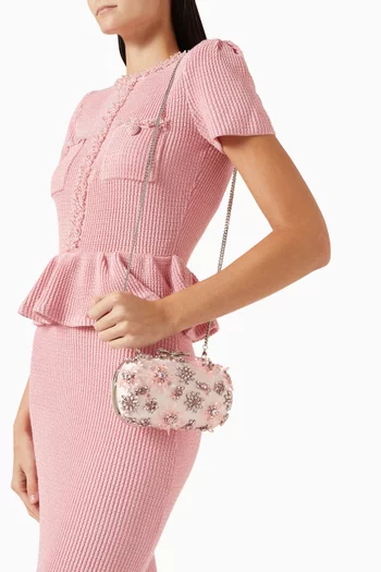 كلاتش مزين بزهور مطرزة بالكريستال ستان