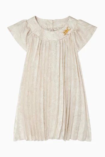 فستان بطيات وطبعة تويل