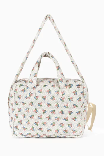 حقيبة دول مزينة بتطريزات فواكه