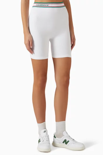 شورت بايكر بنقشة شعار الماركة باهتة