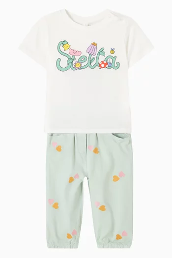 تي شيرت بطبعة بشعار الماركة وغصن قطن