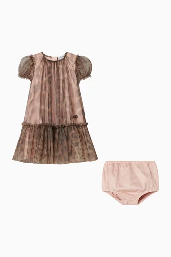 فستان بأجزاء شفافة بلون مغاير