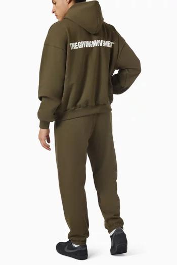 كنزة بغطاء رأس فضفاضة وشعار الماركة قطن