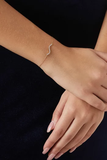 سوار بحلي مستديرة بتصميم مموج مرصعة بالماس ذهب عيار 14