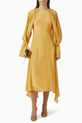 فستان بقصة غير متماثلة