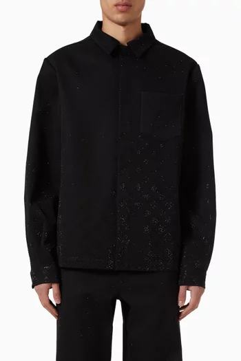 قميص بنقشة شعار الماركة مطرز بأحجار الراين