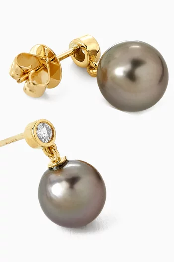 أقراط متدلية طويلة مرصعة بالماس واللؤلؤ ذهب عيار 18