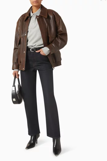 تي شيرت بفتحة رقبة بياقة عالية ورقعة بشعار الماركة جلد للجنسين