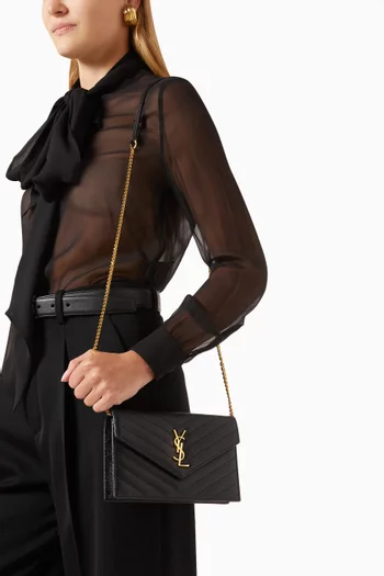 حقيبة صغيرة بتصميم ظرف بشعار كاسندر وسلسلة جلد