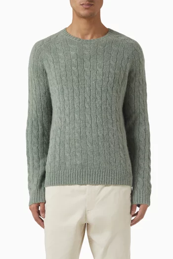 سترة منسوجة بغرزة الضفيرة