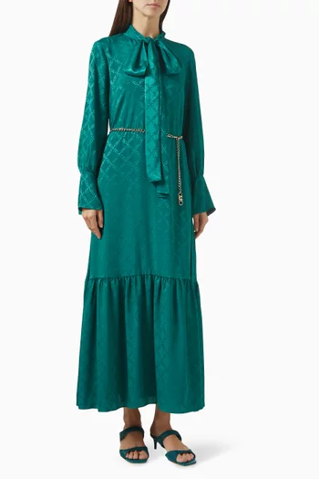 فستان طويل بعقدة ونقشة شعار الماركة جاكار