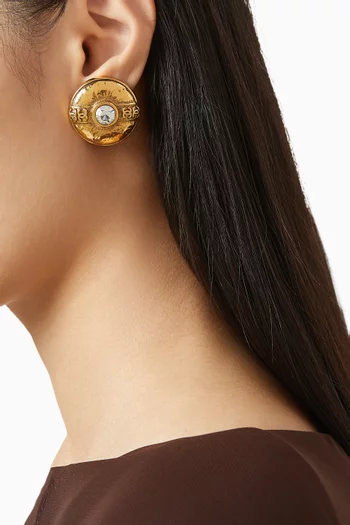 أقراط بتصميم ميدالية بمشبك من عام 1984