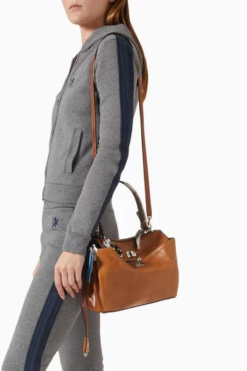 حقيبة يد روديو صغيرة مزينة بحلي جلد