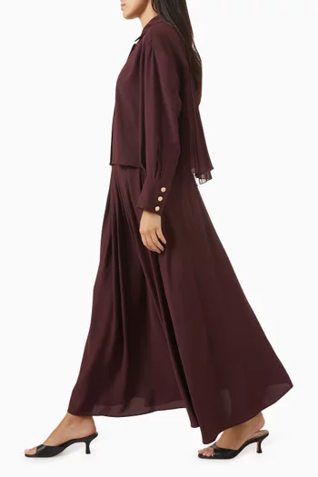 طقم تنورة بجزء بطيات