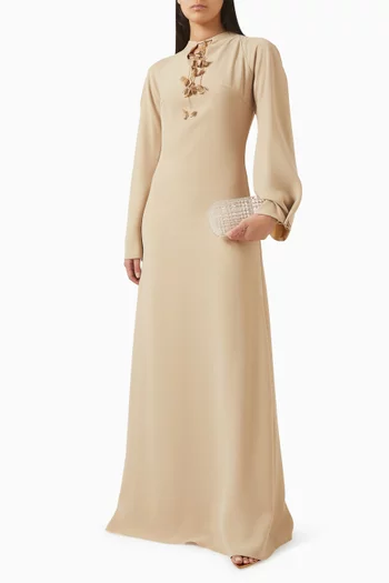 فستان سهرة بشرّابات وزهور