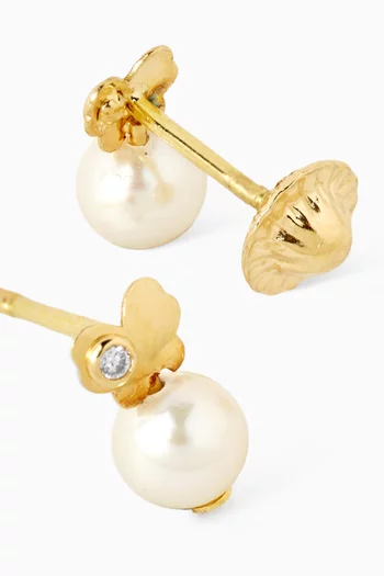 أقراط على شكل فراشة مرصعة بالماس ولؤلؤ متدلي