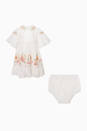 فستان بأكمام فراشة ونقشة زهور