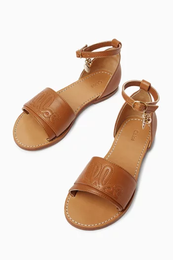 Logo-embossed Sandals in Leather