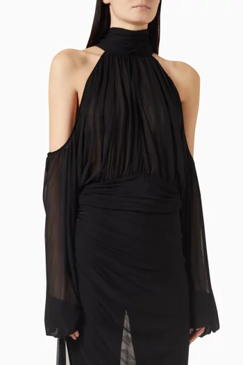 بلوزة بقصة غير متماثلة وأكتاف مكشوفة