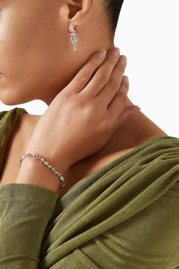 Small Fish Topaz Bracelet in 9kt White Gold