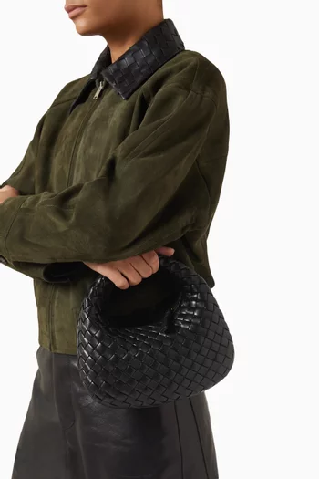 حقيبة بيبي فينيتا بيد علوية جلد مجدول