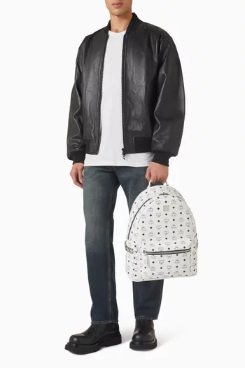 حقيبة ظهر ستارك متوسطة بحلي هرمية على الجانبين قنب مغلف