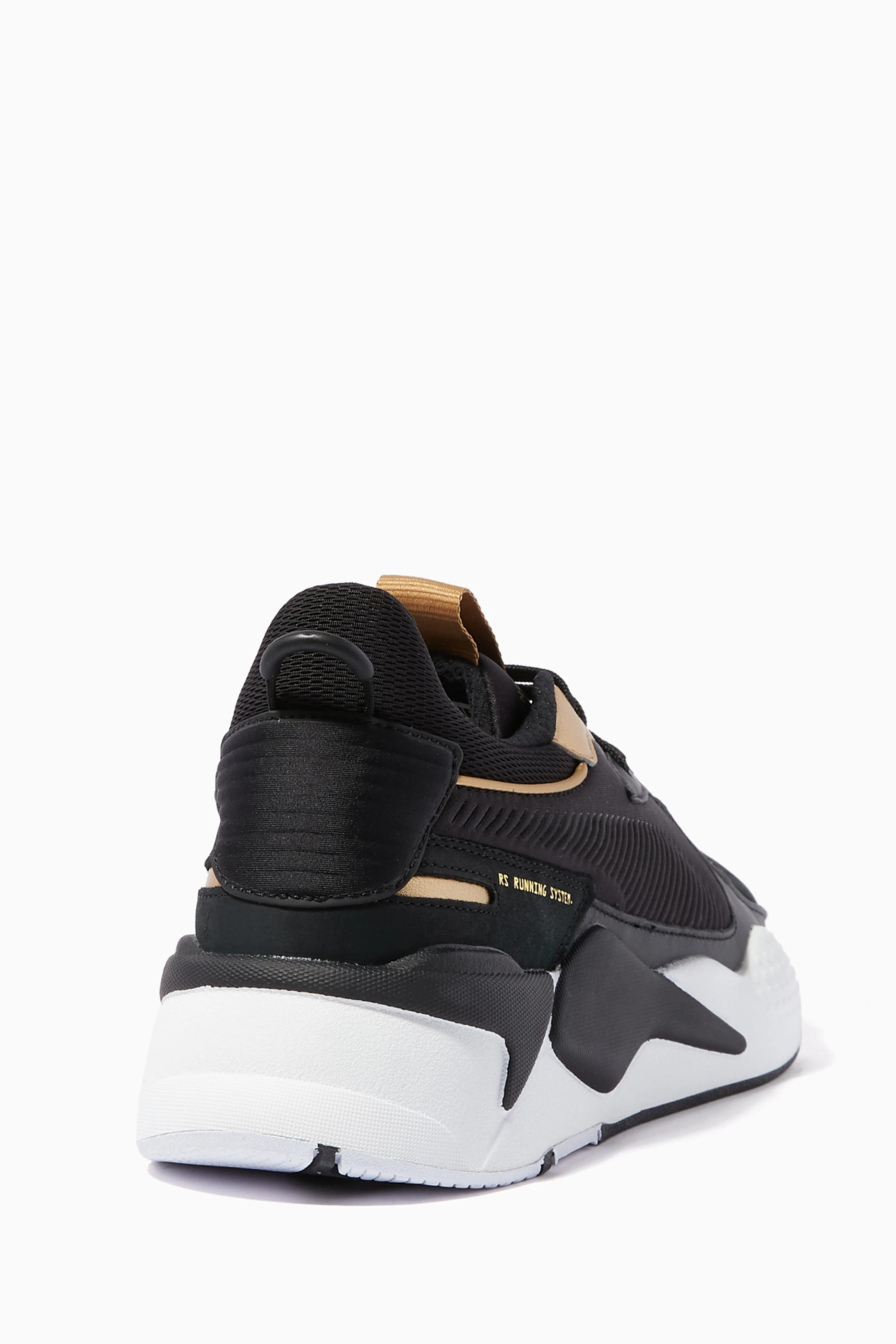 Buy PUMA Select Black Black Gold RS X Trophy Sneakers For Men Online Ounass Bahrain