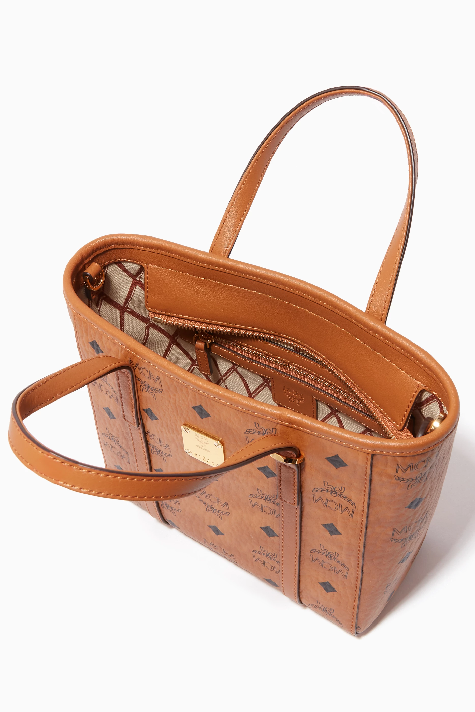 Buy MCM Brown Mini Toni Shopper in Visetos For Women Online Ounass Bahrain