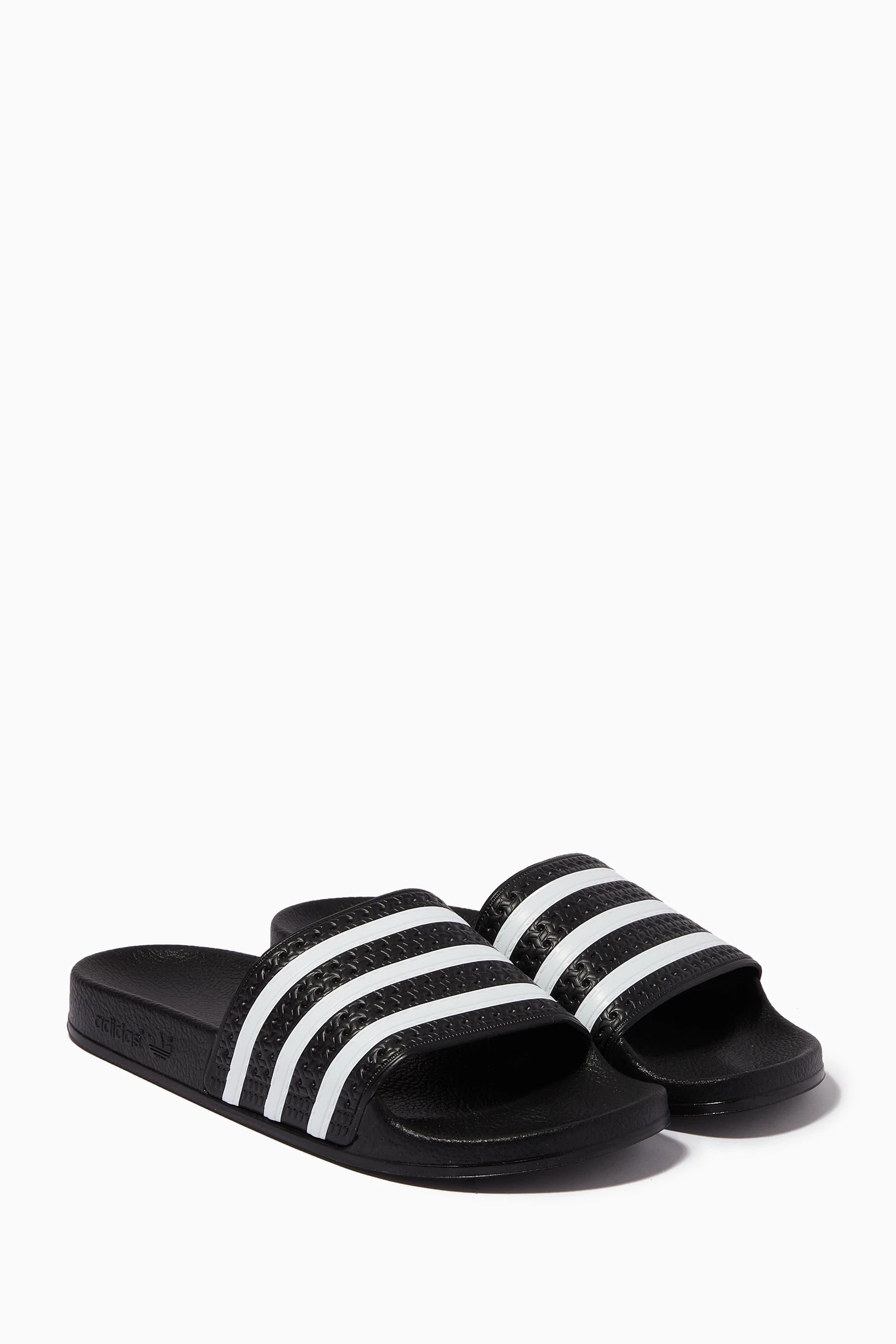 Buy adidas Black Adilette Slide Sandals in Rubber For Boys Online Ounass Bahrain