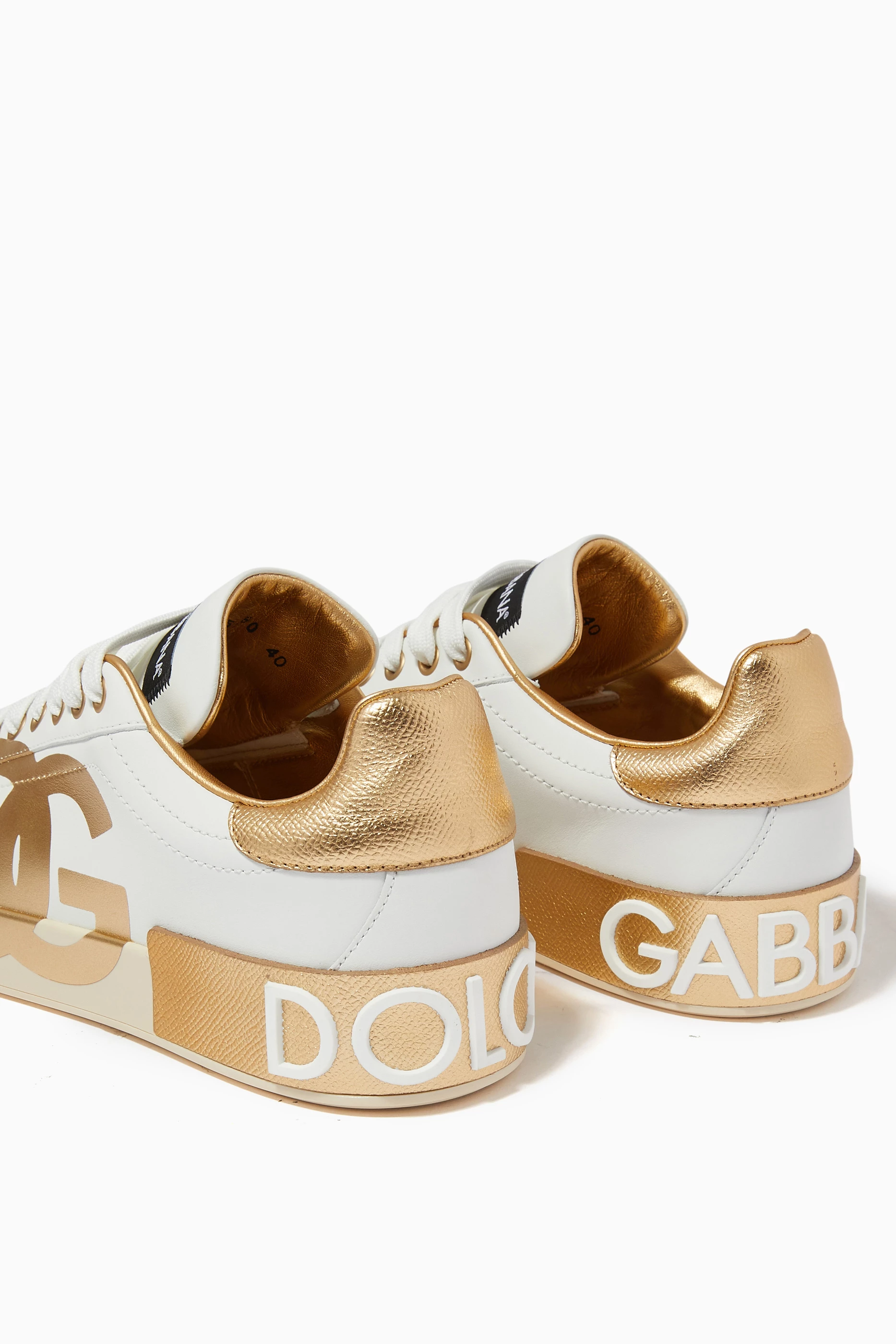 Buy Dolce Gabbana Gold Portofino Sneakers with DG in Leather For Women Online Ounass Bahrain