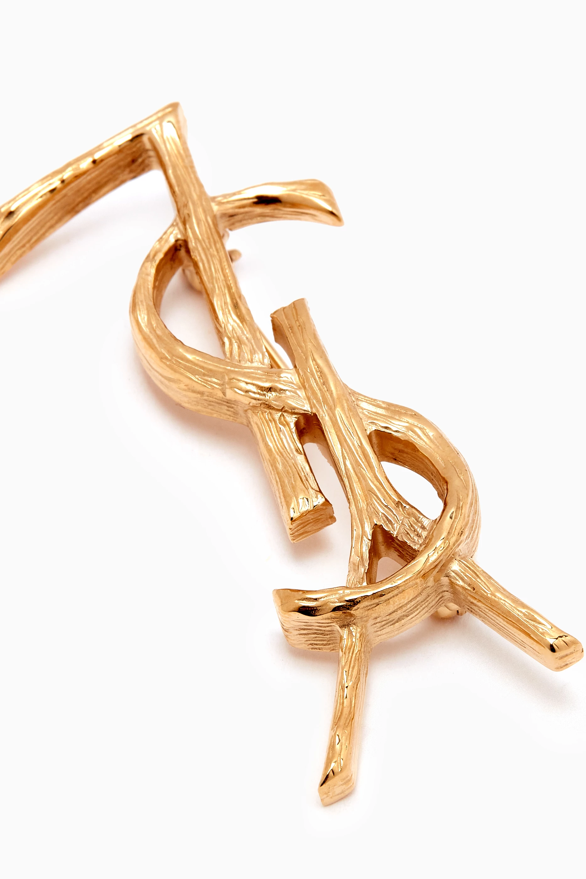 Buy SAINT LAURENT Gold Opyum YSL Brooch in Textured Metal For Women Online Ounass Bahrain
