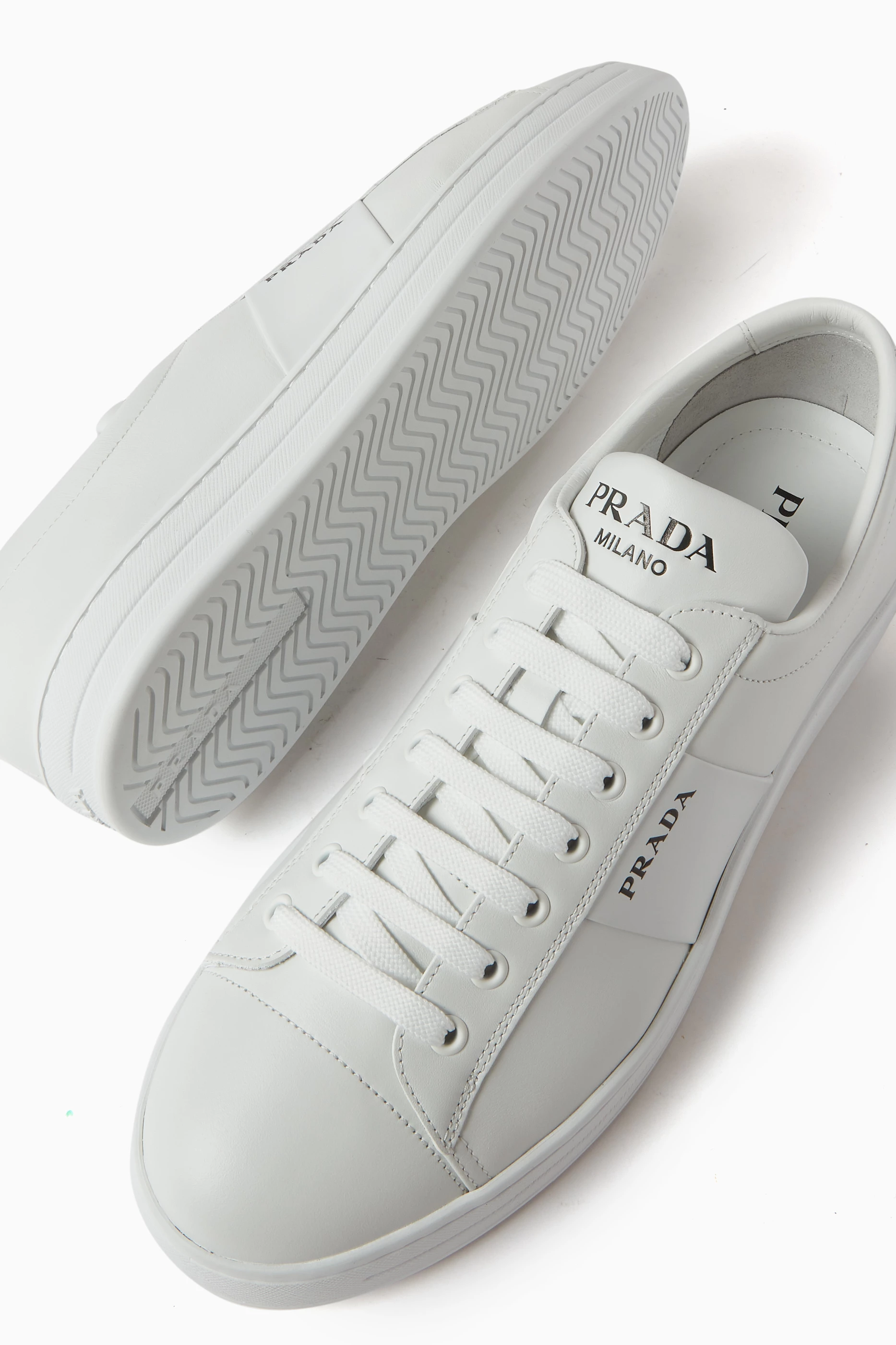 Buy Prada White Vitello Low top Sneakers in Brushed leather For Men Online Ounass Bahrain