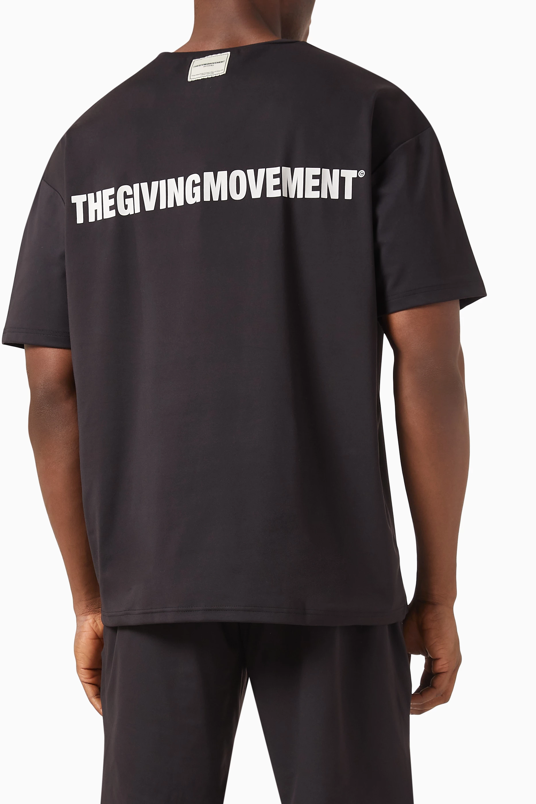 Buy The Giving Movement Black Oversized T-Shirt in Light 