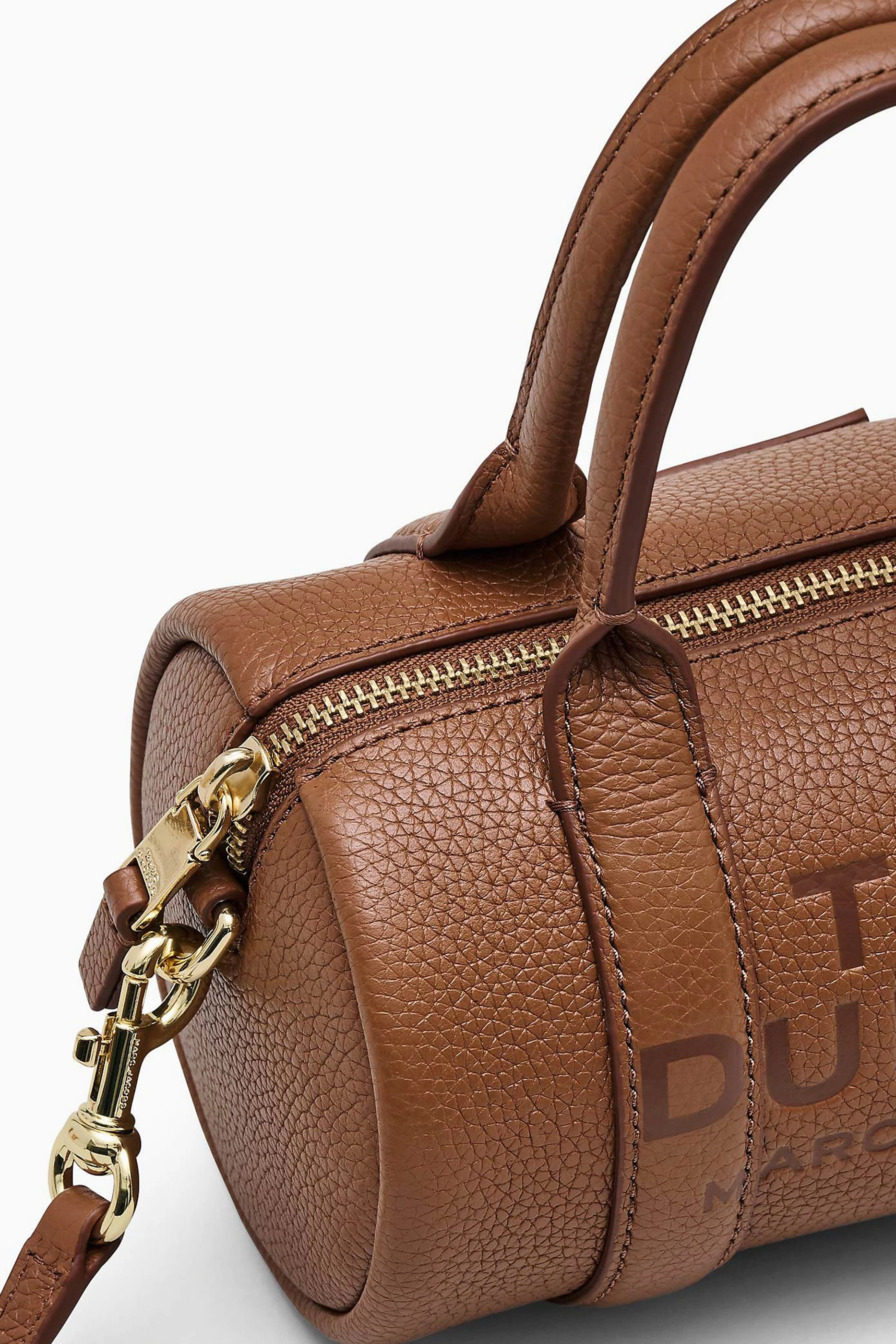 Buy Marc Jacobs Brown The Mini Duffle Crossbody Bag in Leather For