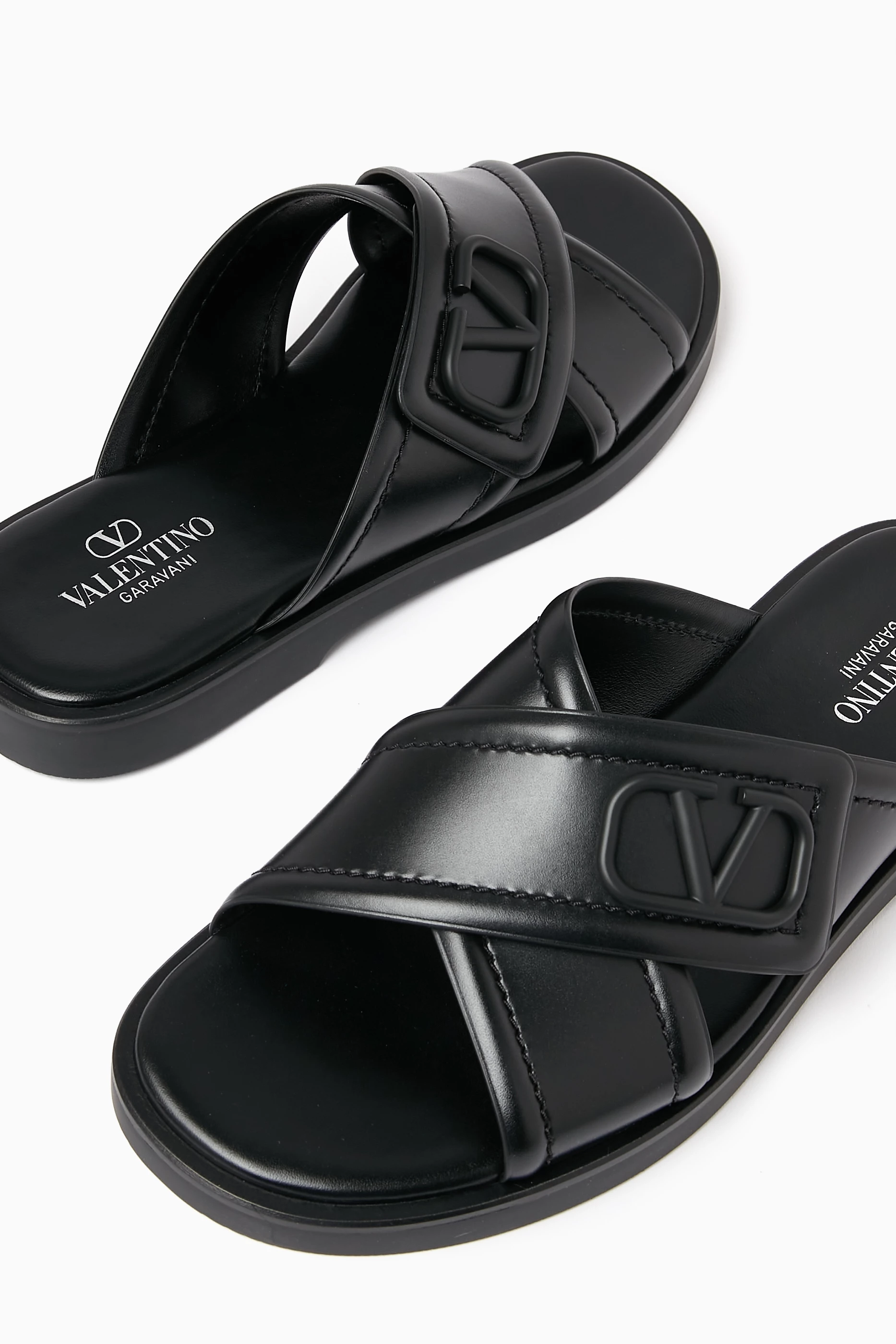 Buy Valentino Garavani Black Valentino Garavani Criss Cross Sandals in Leather For Men Online Ounass Bahrain