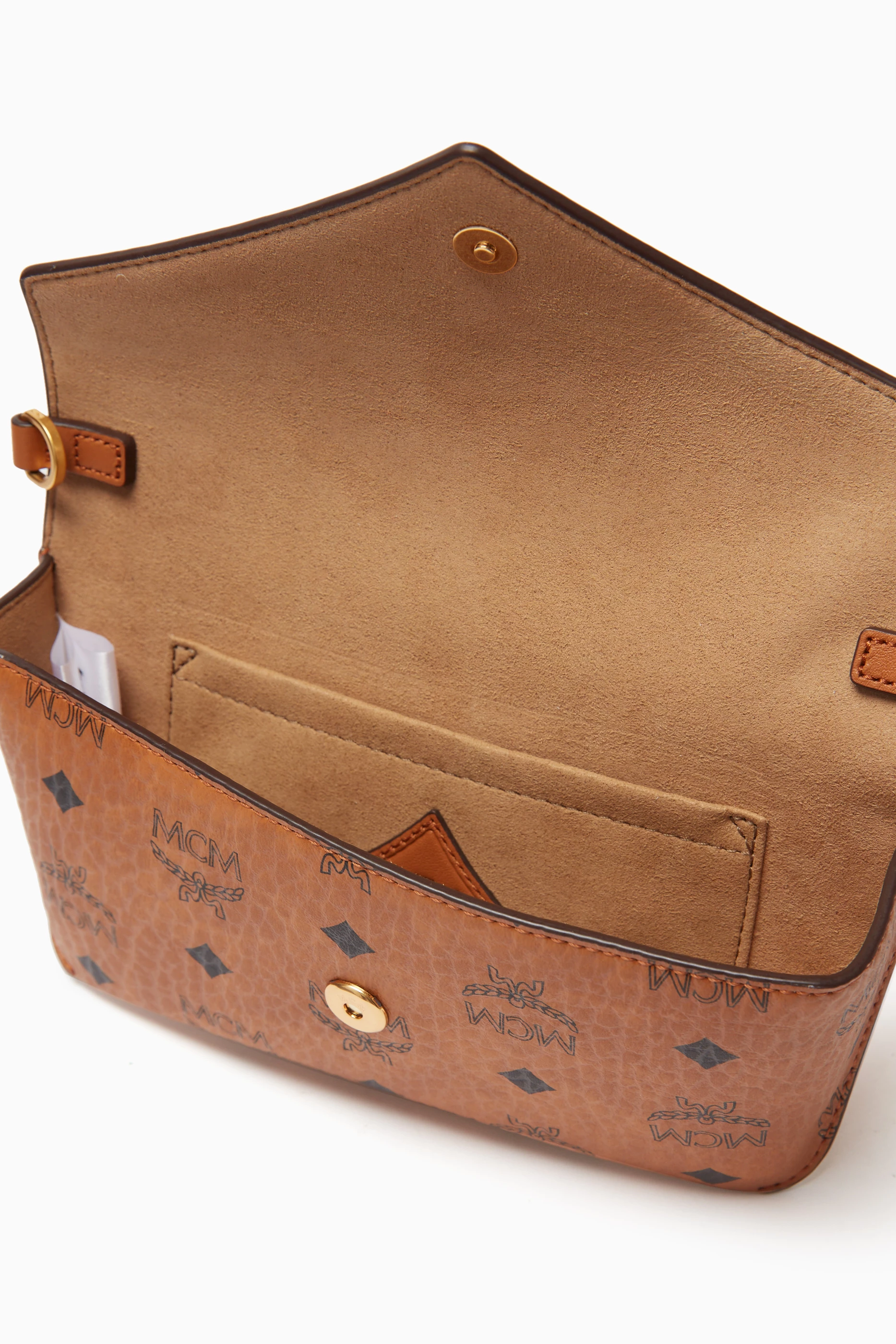 Buy MCM Brown Diamond Flat Pouch in Visetos For Women Online Ounass Bahrain