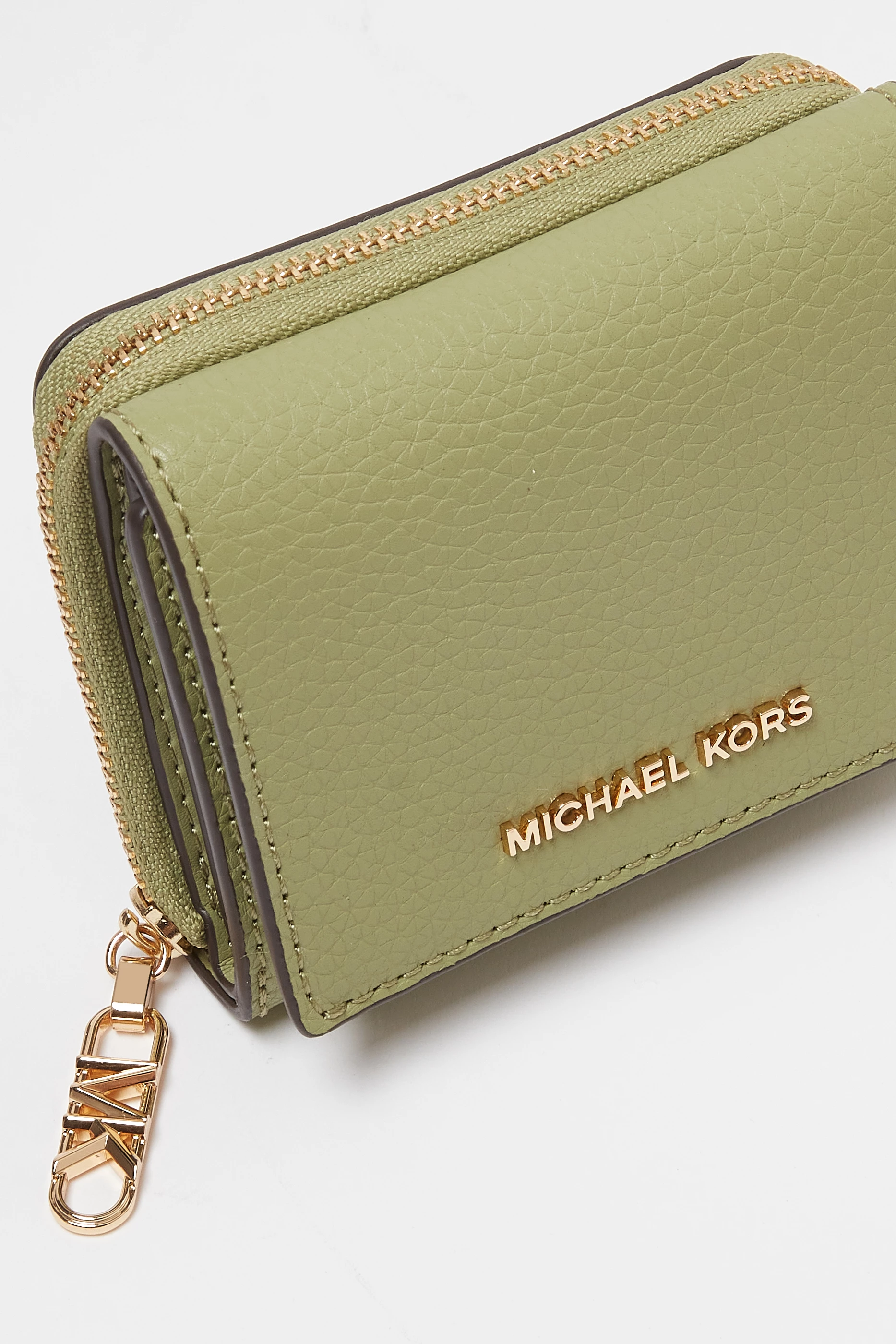 Buy Michael Kors Green Empire Trifold Wallet in Pebbled Leather For Men Online Ounass Bahrain