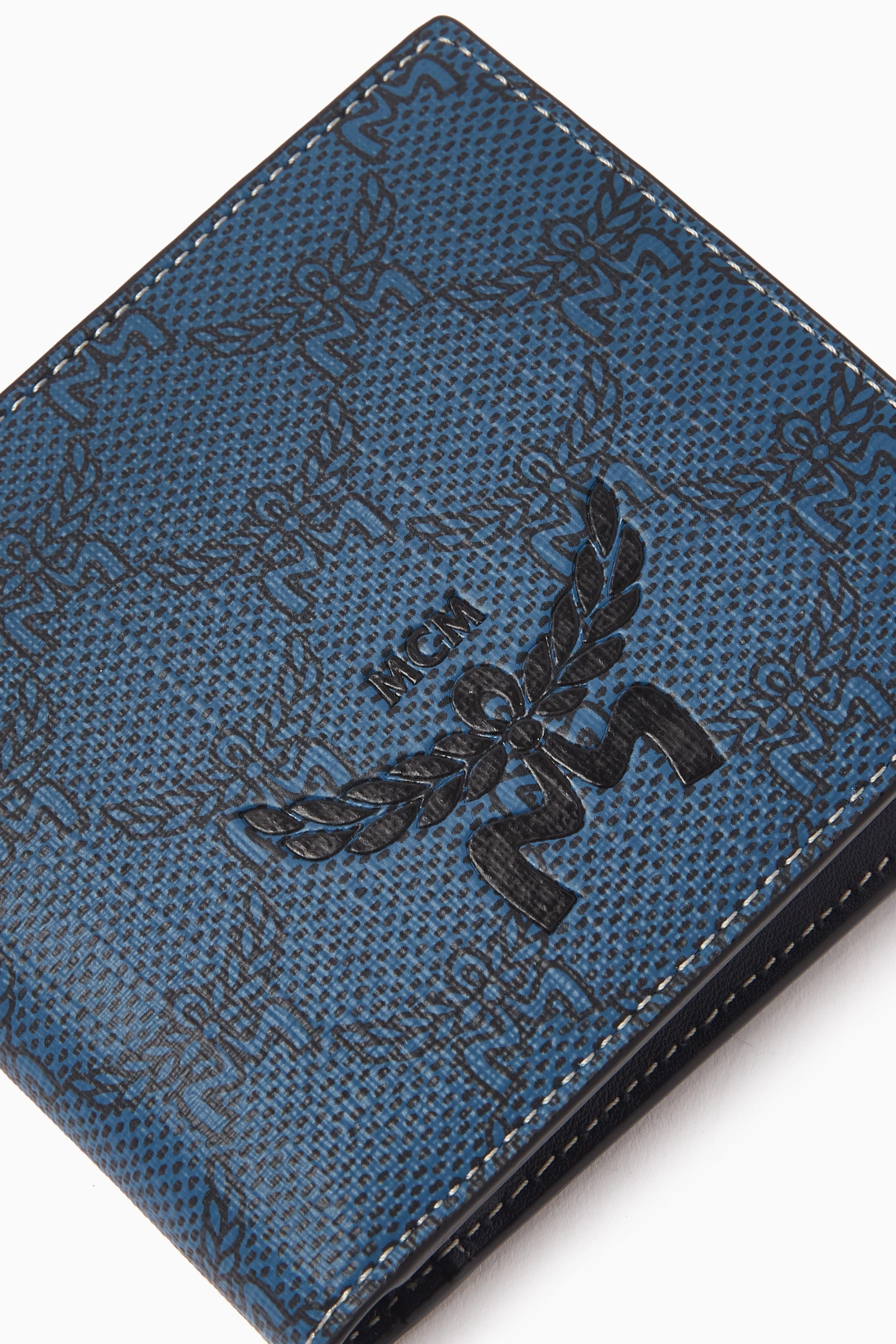 Buy MCM Blue Small Himmel Bifold Wallet in Lauretos Monogram Canvas For Men Online Ounass Bahrain