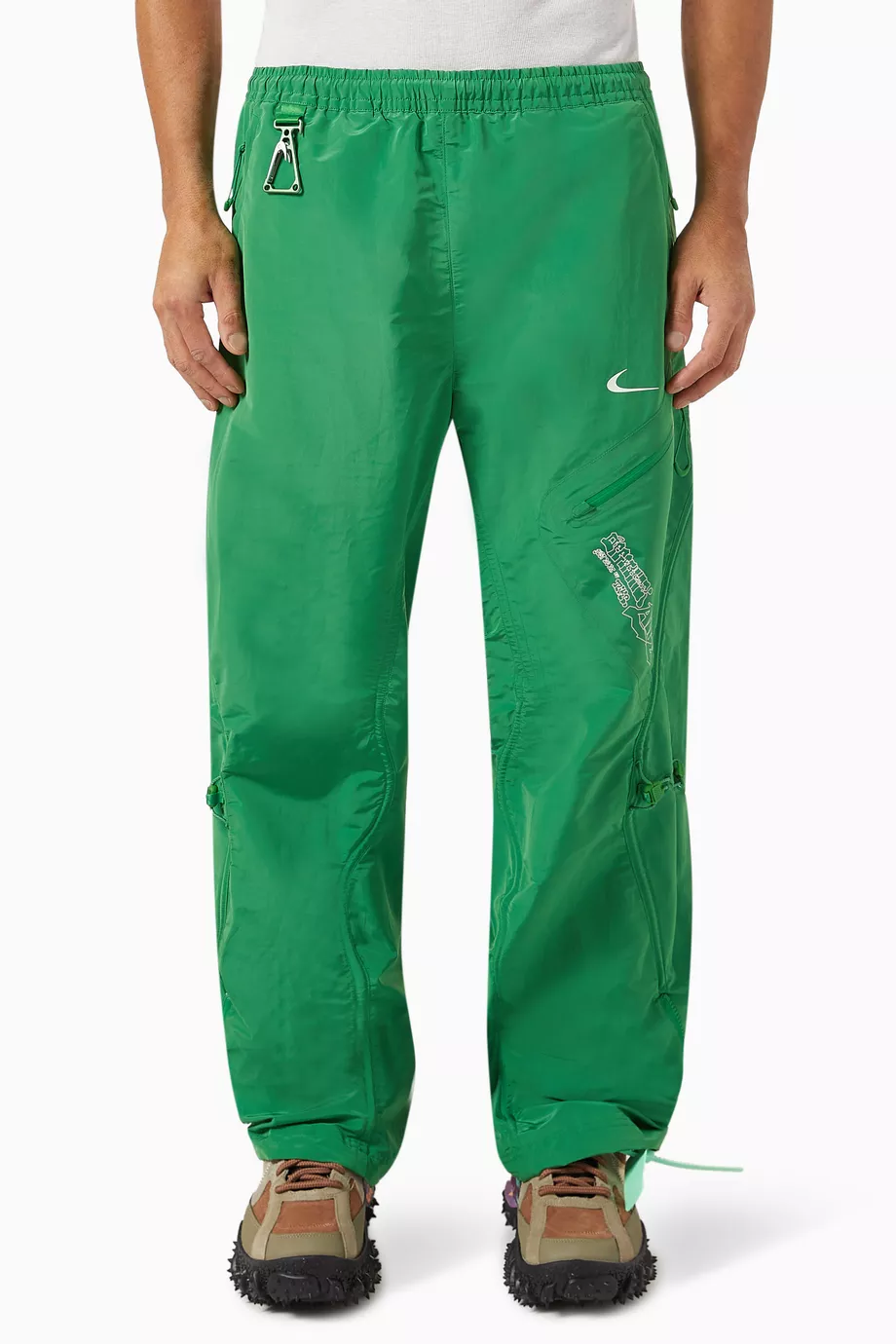 Nike green track pants online